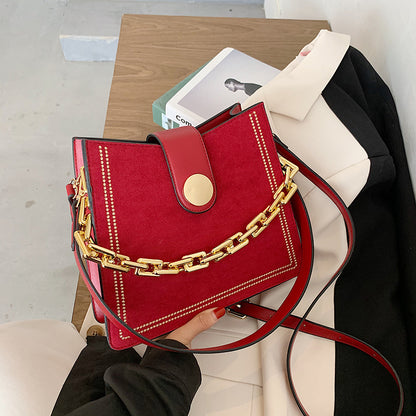 Vintage leather handbag with chain